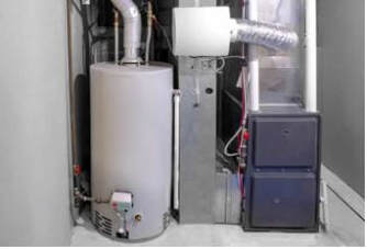 Water heater and furnace installed next to each other