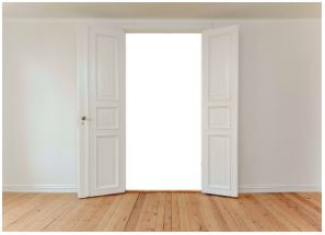 White painted room with open double door
